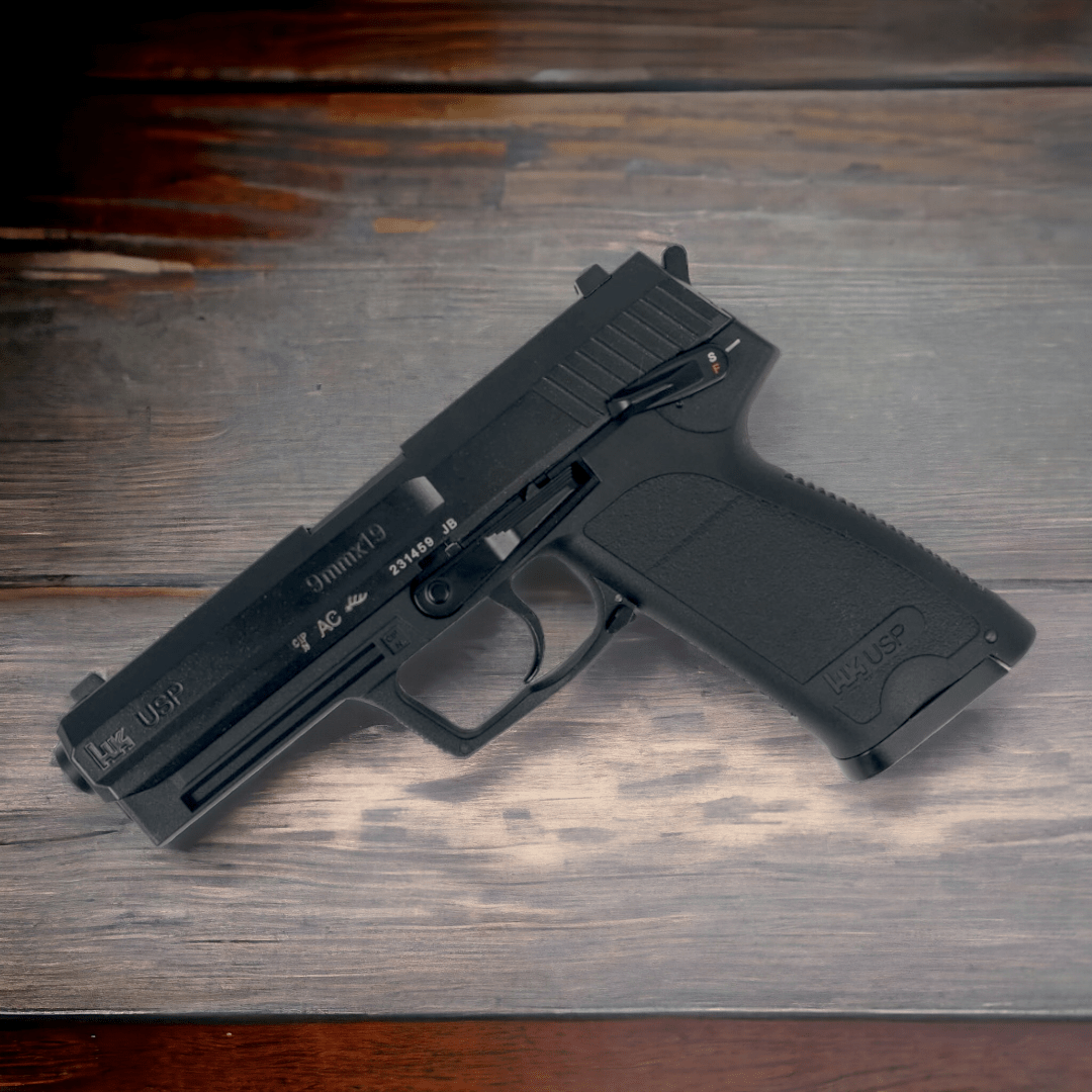 KELe HK USP Manual Springer Gel Blaster in black featuring a detailed design on a wooden surface.