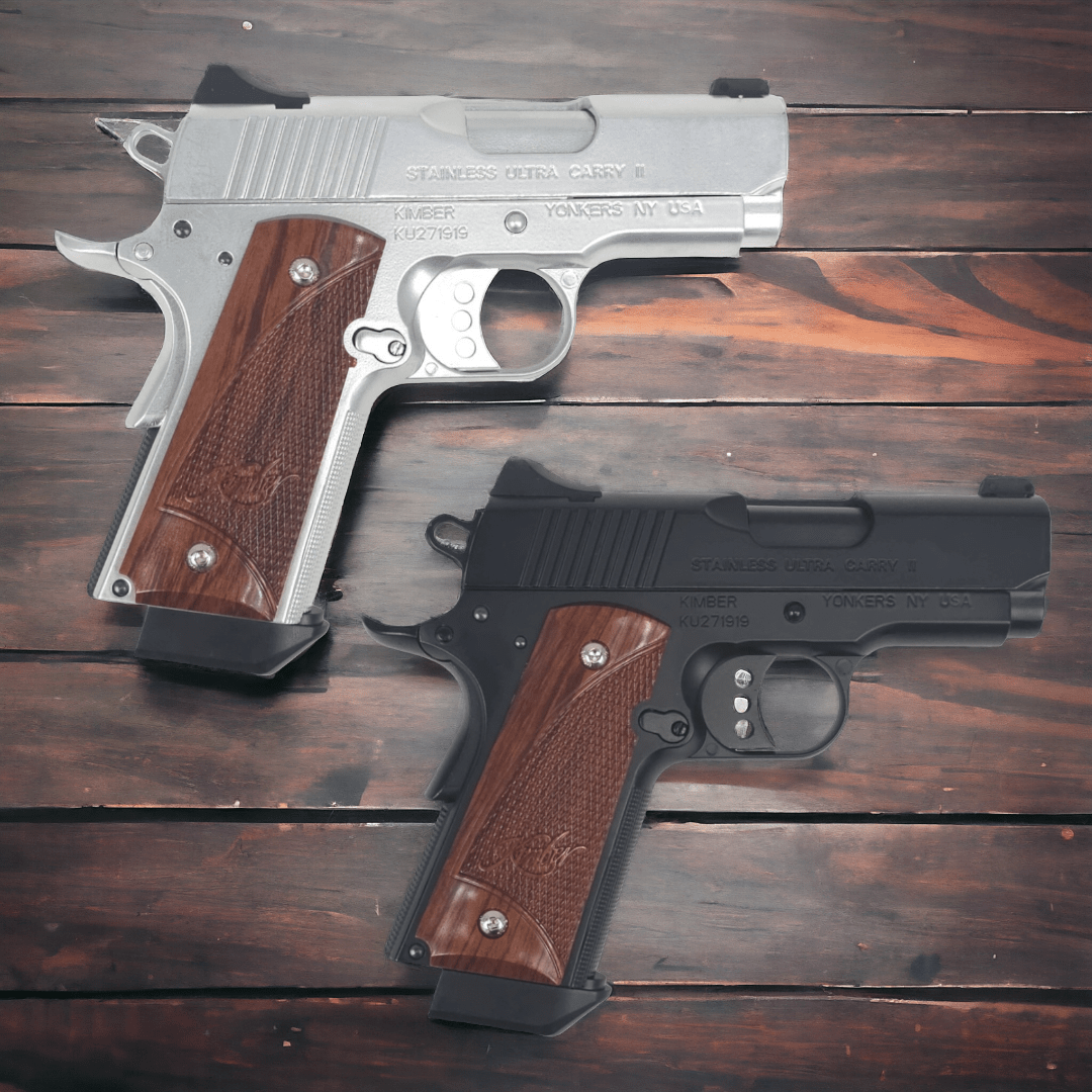 Two KELe Kimber Ultra Carry II Gel Blasters, one silver and one black, showcasing realistic design and details.