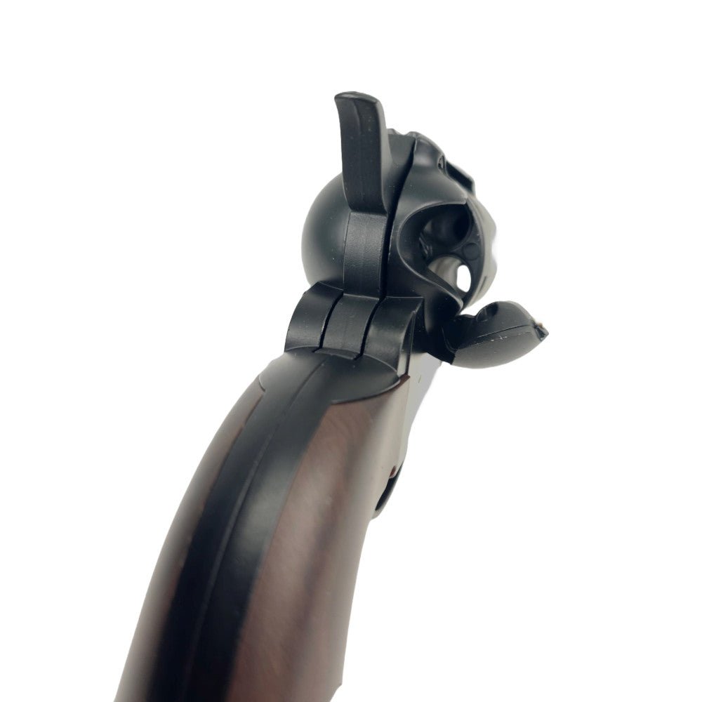 Close-up view of KELe Nylon Colt 1873 Peacemaker revolver showing the hammer and cylinder details.