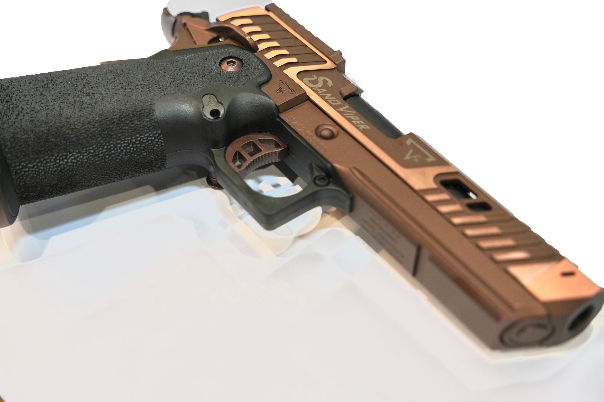 TTI Sand Viper GBB Gel Blaster replica with bronze aluminum finish and textured grip.