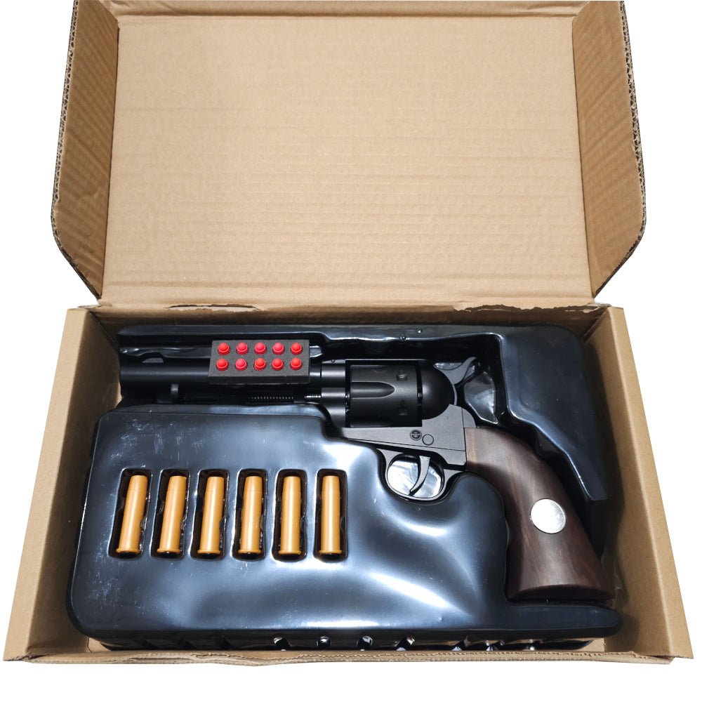 KELe Colt 1873 Peacemaker revolver in packaging with cartridges displayed neatly.